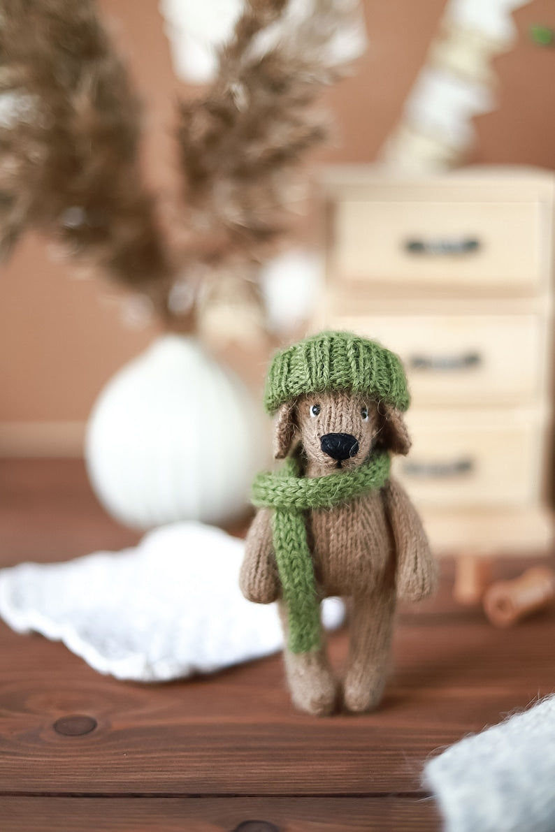 Cute knitted puppy in a hat and scarf Knitting pattern